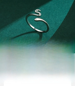 Detail of snake ring with 5A cubic zirconia stones and handcrafted silver setting
