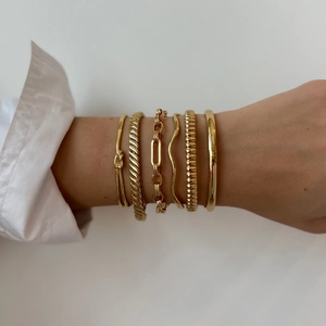Set of six gold stainless steel bracelets featuring rope, chain and minimalist designs
