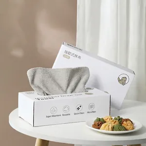 Microfiber kitchen cleaning cloths in a white dispenser box for oil and water absorption
