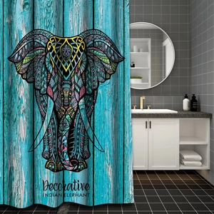 Detailed view of an Indian Elephant shower curtain hanging in a modern gray bathroom
