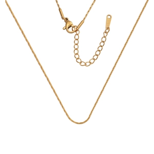 Close-up of 18k gold plated stainless steel chain with lobster clasp and extension link