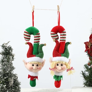 Christmas elf doll ornaments in red and green outfits for holiday tree decoration