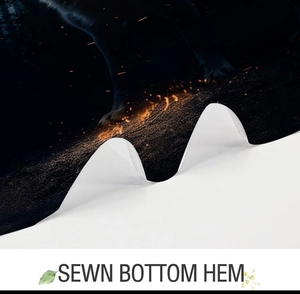 Detail of the high-quality sewn bottom hem on a wolf forest print fabric shower curtain