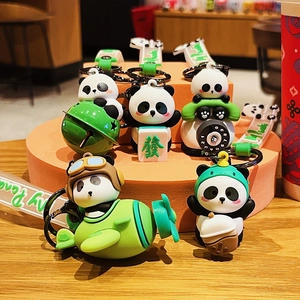 Set di cinque graziosi portachiavi a forma di panda con ciondoli su base arancione