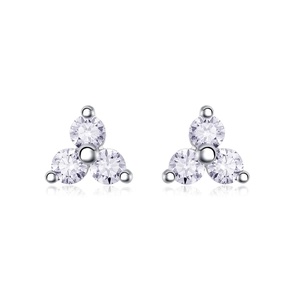 Close-up of sterling silver stud earrings with three round-cut clear gemstones in a floral design