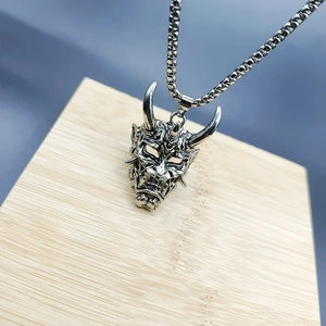 Vintage silver Hannya mask pendant on a box chain for men with detailed engraving