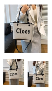 Detail of canvas tote bag with black leather trim and Cloos lettering on front