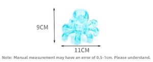 Blue octopus shaped manual massager with detailed 9cm height and 11cm width dimensions