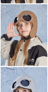 Close-up of kids winter pilot aviator hat with goggles and adjustable buckle strap