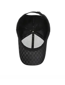 Detail of dark grey baseball cap interior featuring checkered brim and adjustable metal buckle