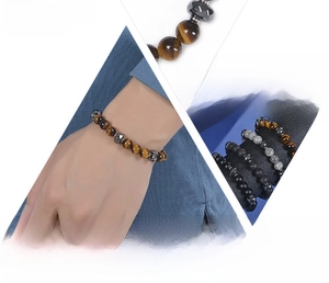 Detail of tiger eye and lava stone beads with stainless steel accents for men and women