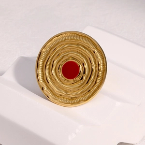 18k gold-plated stainless steel ring with sunburst texture and red center disc