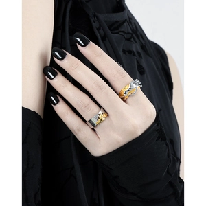 S925 sterling silver ring with two-tone gold plating and textured scale pattern on hand