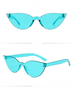 Detail view of lake blue rimless cat eye sunglasses with integrated resin lenses