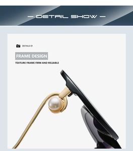 Detail show of stylish sunglasses with black frame, gold temple and elegant pearl accent