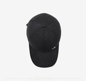 Top view of men's dark grey baseball cap showing textured fabric and metal detail