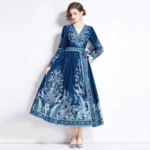 Deep blue paisley V-neck maxi dress with long sleeves and elegant waist tie closure