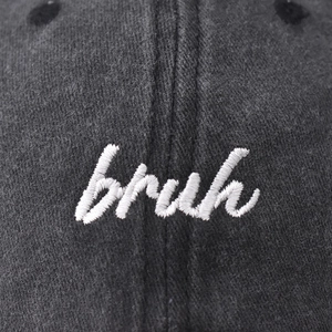 Vintage washed charcoal gray baseball cap with white bruh embroidery detail