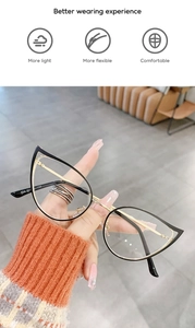 Detail of butterfly optical frames with black front and golden metal temples