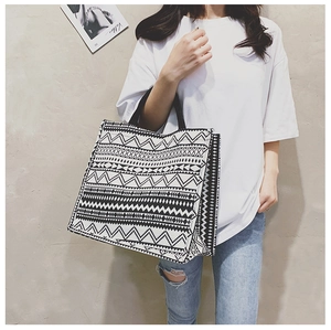 Detail of the black and white geometric ethnic pattern on the large canvas tote bag