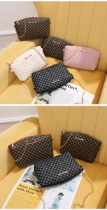 Detail of printed crossbody bag with metal chain strap and monogram pattern in five colors