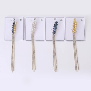 Detailed set of four tassel earrings with rhinestone leaf designs in various colors
