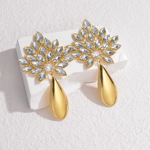 18K gold teardrop earrings with crystals on a minimalist geometric stone base