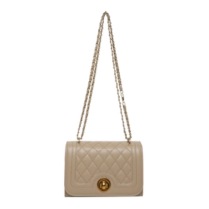 Minimalist beige quilted crossbody bag with gold hardware and elegant chain strap
