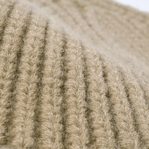Thick ribbed knit bucket hat in beige featuring soft warm plush texture for women