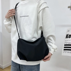Minimalist black pleated crossbody bag for unisex daily commute and casual style