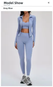 Détail de l'ensemble de yoga bleu grisâtre avec veste et legging de sport taille haute