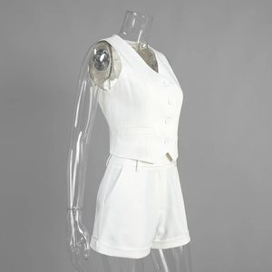 Side view of white tailored V-neck waistcoat and matching cuffed shorts on a mannequin