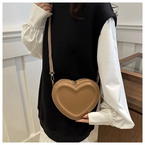 Elegant heart-shaped leather crossbody bag for women in stylish khaki brown finish