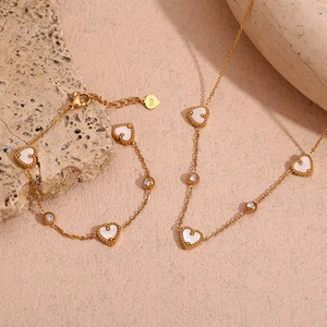 18K gold plated necklace and bracelet set with shell hearts and sparkling zircons