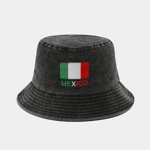 Detail of Mexico flag embroidery on washed black cotton bucket hat with vent holes