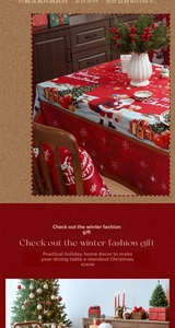 Detail of red Merry Christmas tablecloth showing Santa patterns and fabric texture