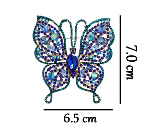 Détails des dimensions d'une broche papillon vintage avec strass bleus, 7.0 cm par 6.5 cm