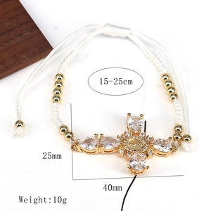 Luxury adjustable white woven cross bracelet with sparkling colorful cubic zirconia