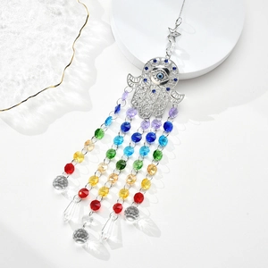 Rainbow crystal suncatcher with silver Hamsa hand charm and faceted chakra colored beads