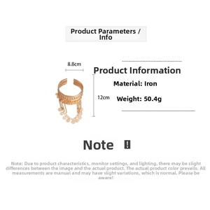 Detail view of golden coin tassel arm cuff with dimensions 8.8cm diameter and 12cm height