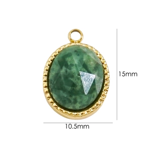 14K gold plated oval pendant with green gemstone and dimensions 15mm by 10.5mm