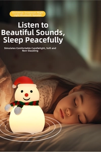 Christmas snowman silicone night light with Bluetooth speaker in a cozy bedroom setting