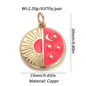 Detailed view of a gold-plated copper pendant with red enamel sun and moon design