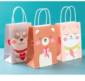 Detail of cartoon animal gift bags with soft colors and white handles on blue background