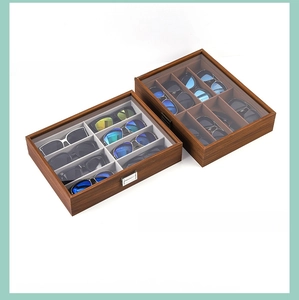 Macro detail of wood texture 8-slot sunglasses box with metal latch and clear window