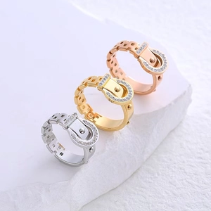 Minimalist buckle ring with micro-paved crystals in silver, gold, and rose gold finishes