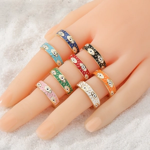 Set of eight colorful enamel Evil Eye open rings in gold plated finish for women