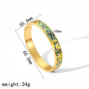 Detail showing 18k gold floral enamel bangle dimensions 55.4mm x 65.2mm and weight 34g