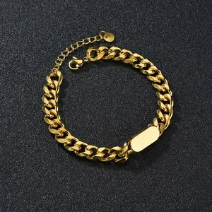Detailed close-up of golden stainless steel Cuban chain ID bracelet with adjustable lobster clasp
