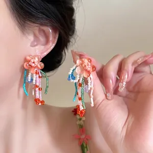 S925 silver flower tassel earrings with peach resin petals and colorful beaded strands